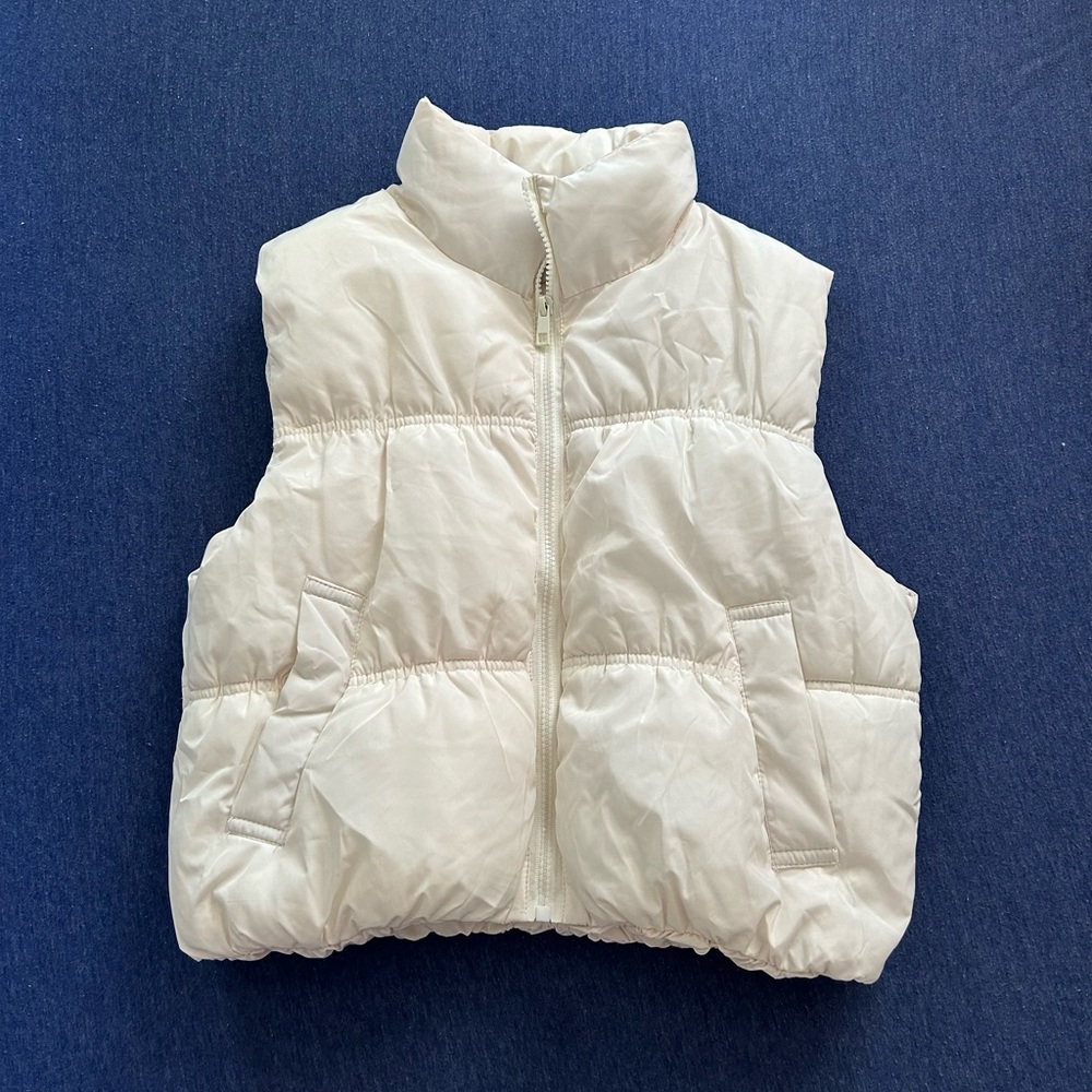 White puff cropped vest